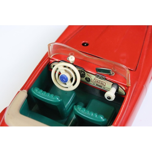 1262 - Original boxed Schuco 5503 Elektro Phanomenal tin plate car in red complete with 6 x wooden pegs, re... 