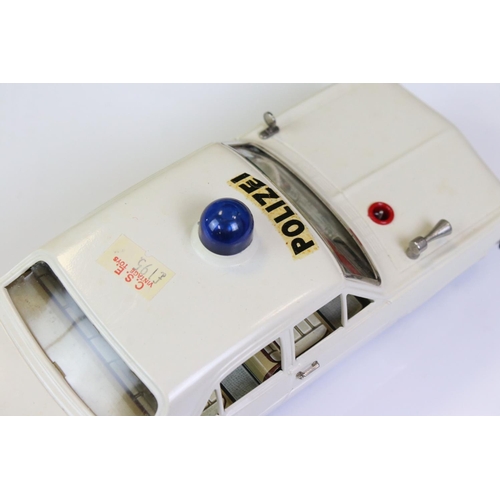 1263 - Boxed Schuco Alarm-Car 5340 Opel Admiral tin plate Police car in white, with aerial, blue light and ... 