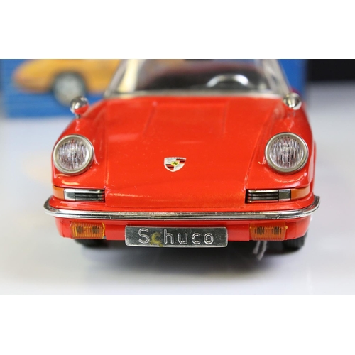 1265 - Boxed Schuco clockwork Porsche Targa 911S in red with black roof, vg condition with only minor paint... 