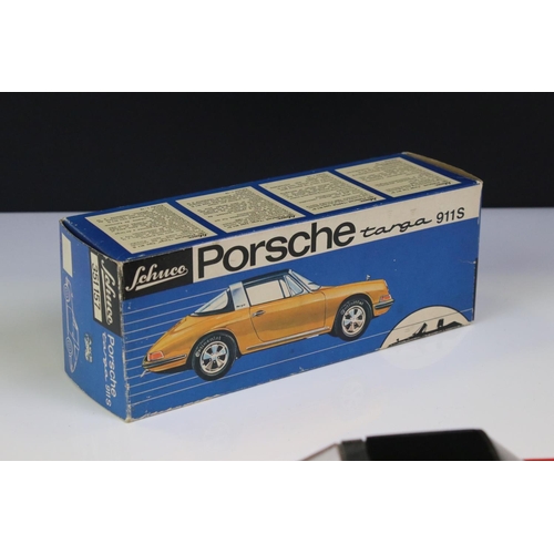 1265 - Boxed Schuco clockwork Porsche Targa 911S in red with black roof, vg condition with only minor paint... 