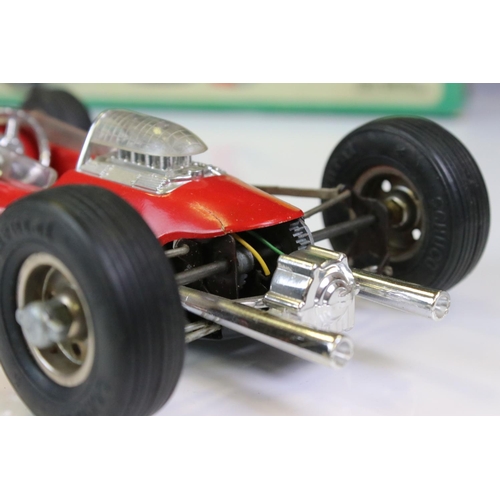 1267 - Boxed Schuco 1079 Dynamo Lotus tin plate F1 racing car with remote controller, in red, race number 1... 