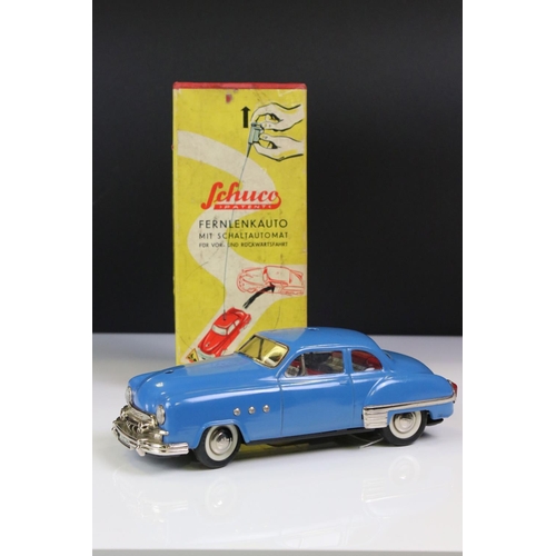 1268 - Boxed Schuco 5301 Fernlenkauto Ingenico tin plate clockwork car in blue, chassis loose from body, wi... 