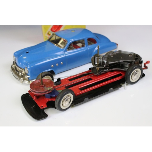 1268 - Boxed Schuco 5301 Fernlenkauto Ingenico tin plate clockwork car in blue, chassis loose from body, wi... 