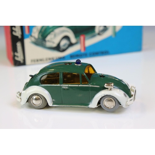 1271 - Boxed Schuco VW Polizeiwagen 3000 tin plate clockwork car compete with accessories and key, vg