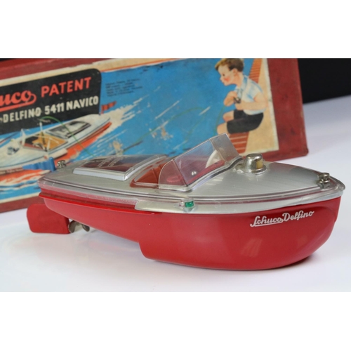 1274 - Boxed Schuco Elektro Delfino 5411 Navico electric motor  boat in silver & red and complete with inst... 