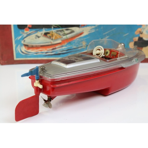 1274 - Boxed Schuco Elektro Delfino 5411 Navico electric motor  boat in silver & red and complete with inst... 