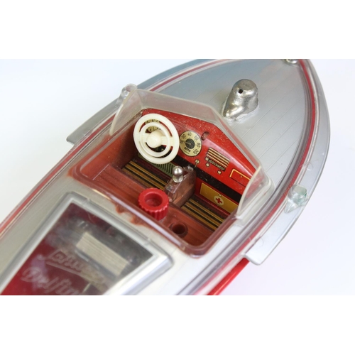 1274 - Boxed Schuco Elektro Delfino 5411 Navico electric motor  boat in silver & red and complete with inst... 