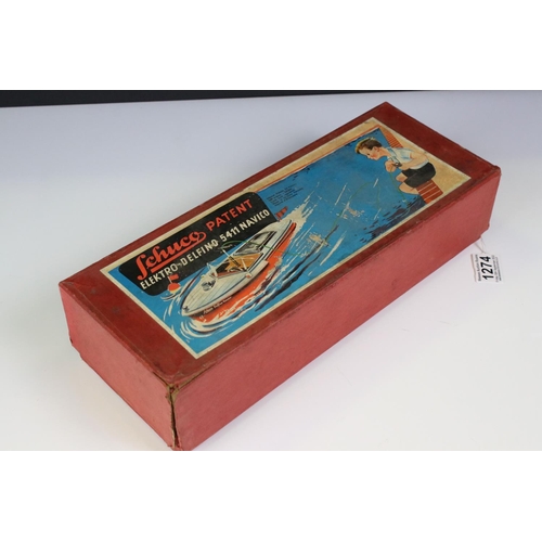 1274 - Boxed Schuco Elektro Delfino 5411 Navico electric motor  boat in silver & red and complete with inst... 