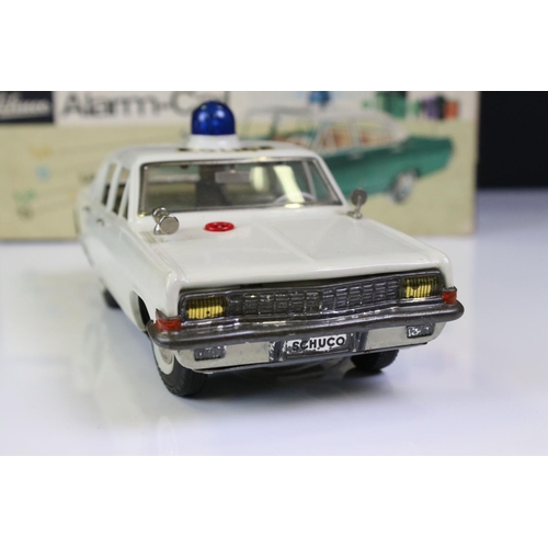 1275 - Boxed Schuco Alarm-Car 5340 Opel Admiral tin plate Police car in white, with aerial, blue light and ... 