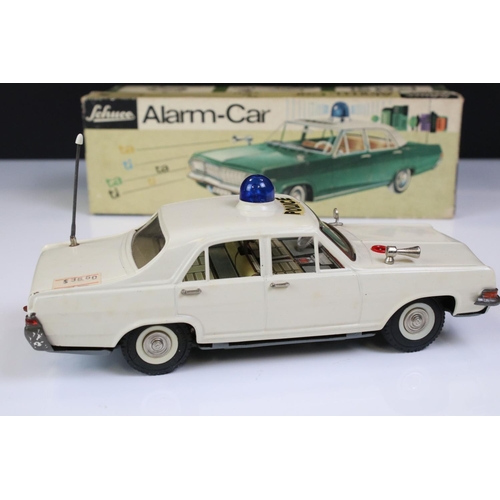 1275 - Boxed Schuco Alarm-Car 5340 Opel Admiral tin plate Police car in white, with aerial, blue light and ... 