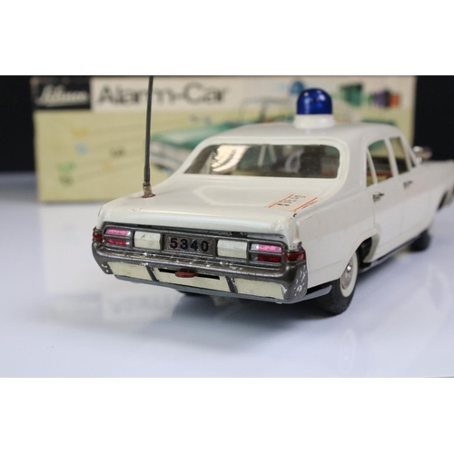 1275 - Boxed Schuco Alarm-Car 5340 Opel Admiral tin plate Police car in white, with aerial, blue light and ... 