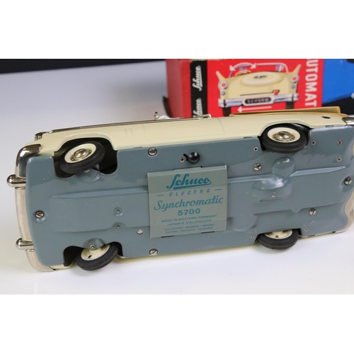 1275A - Boxed Schuco Synchromatic 5700 tin plate Packard model with white body and beige fins, red interior,... 