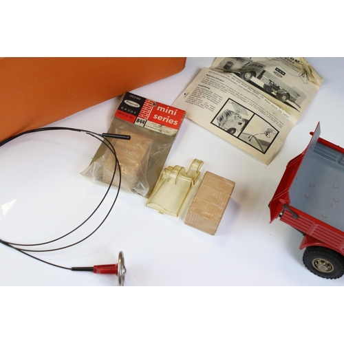 1276 - Boxed Schuco 6084 Lastomat tin plate model in red with instructions and remote control steering whee... 