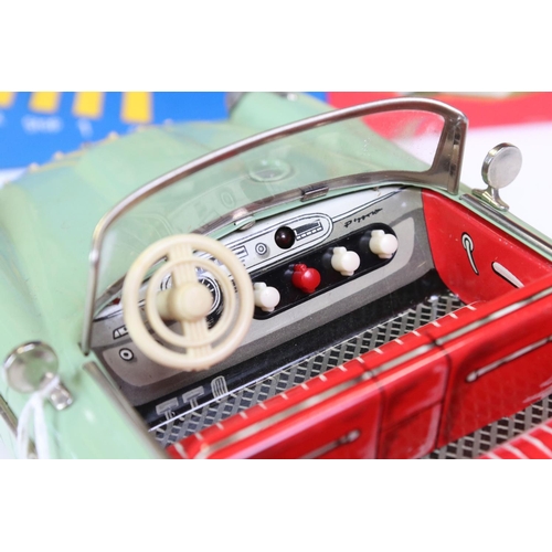 1276A - Boxed Schuco Synchromatic 5700 tin plate Packard model with pale green body and beige fins, red inte... 