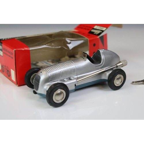 1283 - Four boxed Schuco Micro Racer 1043/2 Mercedes anno 1936 clockwork models, all with keys, 3 x with in... 