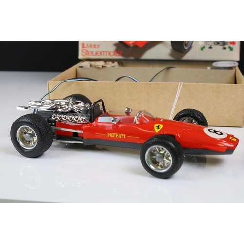 1284 - Boxed Schuco Servo 5312 Elektro Fernlink Ferrari Frmel 2 model in red with race number 8, ex