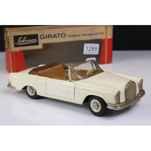 1289 - Boxed Schuco 4000 Girato Schaltauto Mercedes 250 SE in white, broken mascot, otherwise gd, tatty box... 