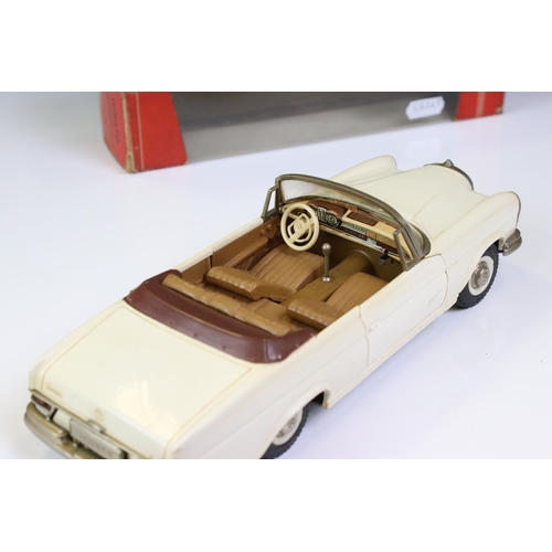 1289 - Boxed Schuco 4000 Girato Schaltauto Mercedes 250 SE in white, broken mascot, otherwise gd, tatty box... 