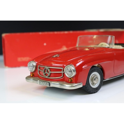 1291 - Schuco Clockwork tinplate remote control 2095 Mercedes 190 SL in red, with instructions and box tray