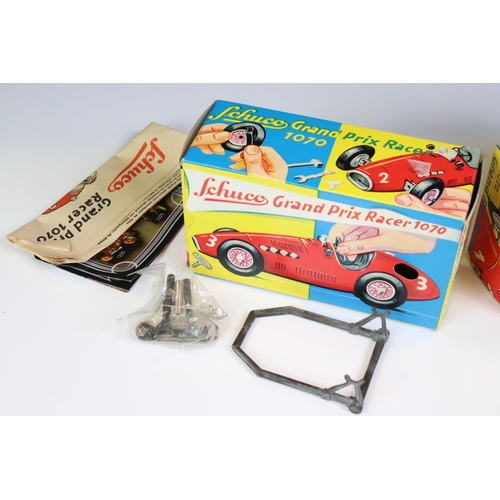 1294 - Two boxed Schuco Grand Prix Racer clockwork tin plate models to include 1071 in silver and 1070 in b... 