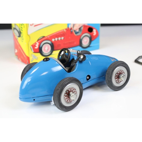 1294 - Two boxed Schuco Grand Prix Racer clockwork tin plate models to include 1071 in silver and 1070 in b... 