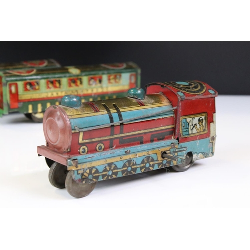 1394 - O Gauge tin plate Janta Express, Indian manufacturer comprising of clockwork  -wheel Locomotive with... 