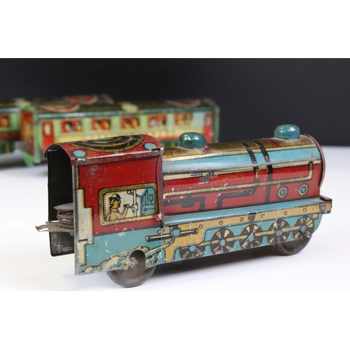 1394 - O Gauge tin plate Janta Express, Indian manufacturer comprising of clockwork  -wheel Locomotive with... 