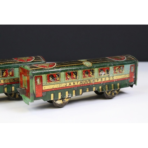 1394 - O Gauge tin plate Janta Express, Indian manufacturer comprising of clockwork  -wheel Locomotive with... 