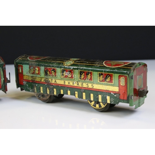 1394 - O Gauge tin plate Janta Express, Indian manufacturer comprising of clockwork  -wheel Locomotive with... 