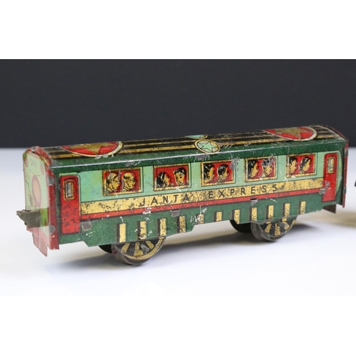 1394 - O Gauge tin plate Janta Express, Indian manufacturer comprising of clockwork  -wheel Locomotive with... 