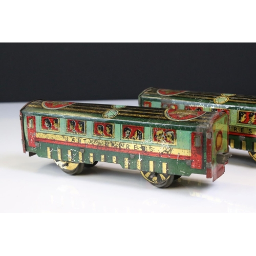 1394 - O Gauge tin plate Janta Express, Indian manufacturer comprising of clockwork  -wheel Locomotive with... 