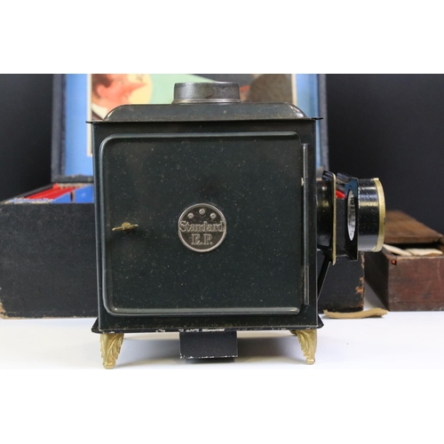 1395 - The EP Magic Lantern 'Lanterna Magica' with instructions, slides and paperwork plus 2 x additional w... 