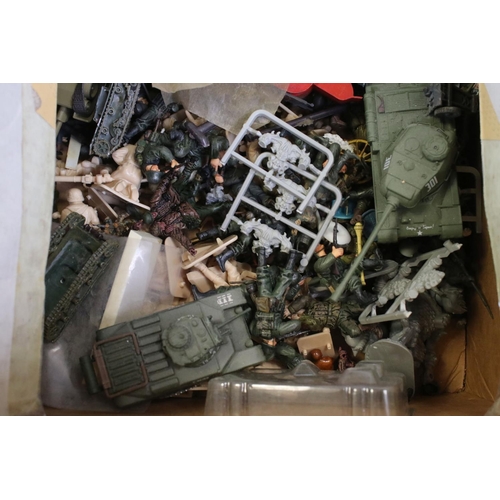 1312 - Large quantity of miniature military vehicles, mainly tanks, plus a quantity of various plastic figu... 