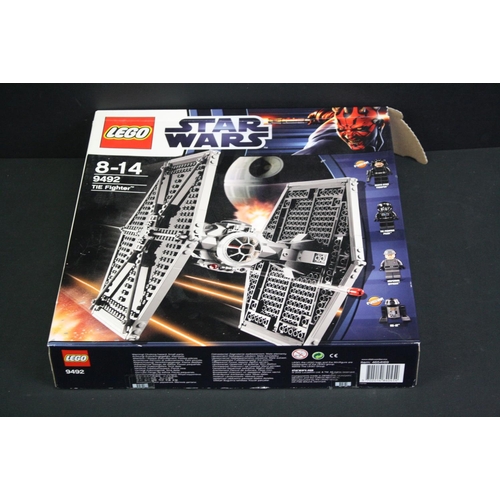 1423 - Star Wars - Three boxed Lego Star Wars sets to include 9496 Desert Skiff, 9492 TIE Fighter & 9493 X ... 