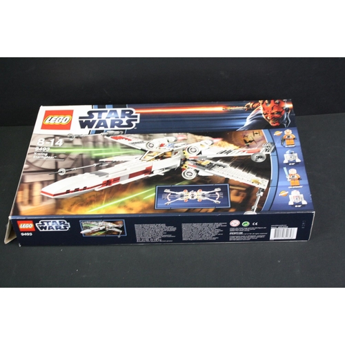 1423 - Star Wars - Three boxed Lego Star Wars sets to include 9496 Desert Skiff, 9492 TIE Fighter & 9493 X ... 