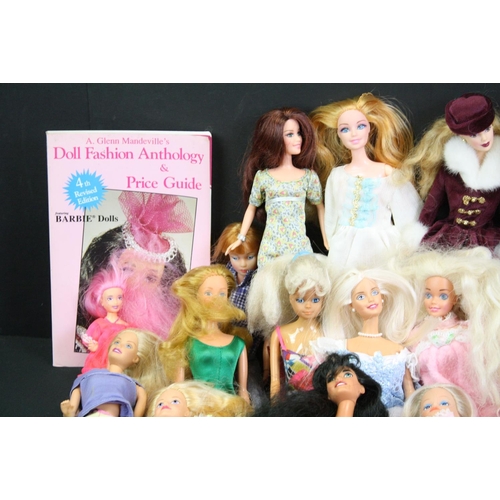 330 - Quantity of mainly contemporary dolls to include Barbie, Action Man etc plus a Dolls Fashion Antholo... 