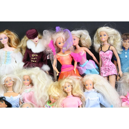 330 - Quantity of mainly contemporary dolls to include Barbie, Action Man etc plus a Dolls Fashion Antholo... 