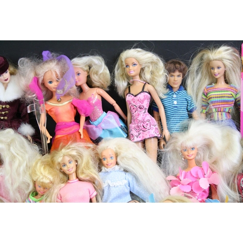 330 - Quantity of mainly contemporary dolls to include Barbie, Action Man etc plus a Dolls Fashion Antholo... 