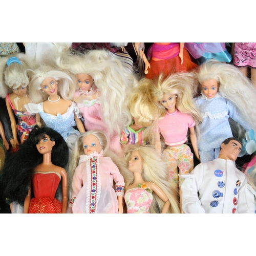 330 - Quantity of mainly contemporary dolls to include Barbie, Action Man etc plus a Dolls Fashion Antholo... 