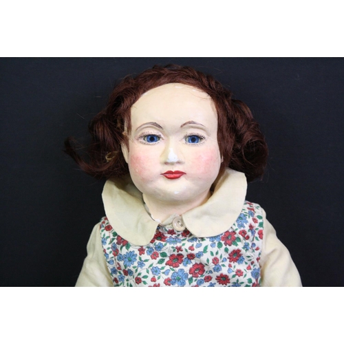 332 - Early 20th C bisque headed doll with blue glass eyes marked PD 1/2 9 to neck, soft bodied with bisqu... 