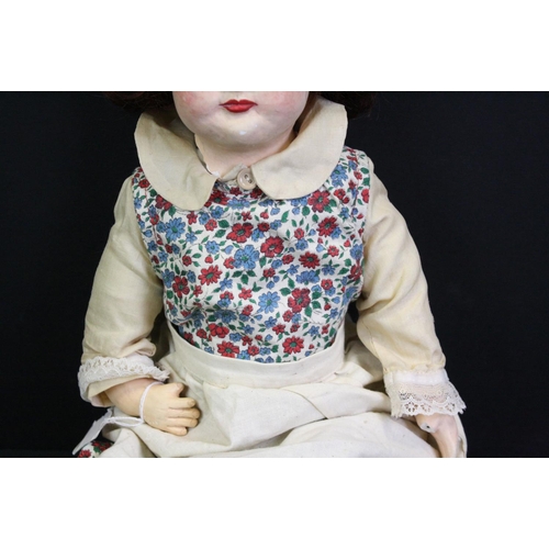 332 - Early 20th C bisque headed doll with blue glass eyes marked PD 1/2 9 to neck, soft bodied with bisqu... 