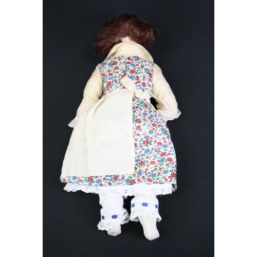 332 - Early 20th C bisque headed doll with blue glass eyes marked PD 1/2 9 to neck, soft bodied with bisqu... 