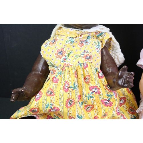 336 - Armand Marseille black doll with glass eyes marked AM Germany 7 1/2 to back of neck, no teeth, appro... 