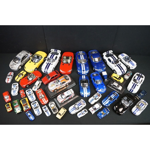 1104 - Over 40 diecast models featuring various scales to include Maisto, Burago etc