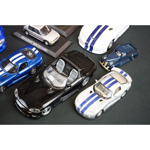 1104 - Over 40 diecast models featuring various scales to include Maisto, Burago etc