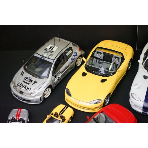 1104 - Over 40 diecast models featuring various scales to include Maisto, Burago etc