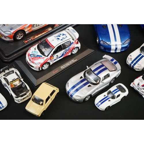 1104 - Over 40 diecast models featuring various scales to include Maisto, Burago etc