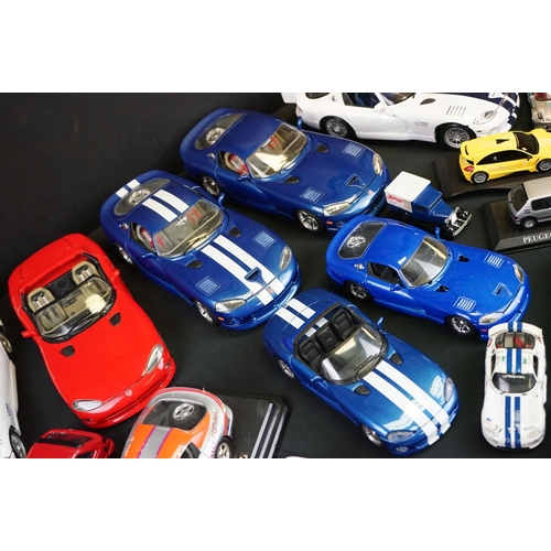 1104 - Over 40 diecast models featuring various scales to include Maisto, Burago etc