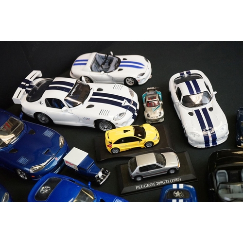 1104 - Over 40 diecast models featuring various scales to include Maisto, Burago etc