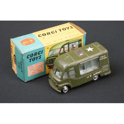 1185 - Two boxed Corgi diecast models to include 479 Commer Mobile Camera Van (no accessories) and 359 Army... 